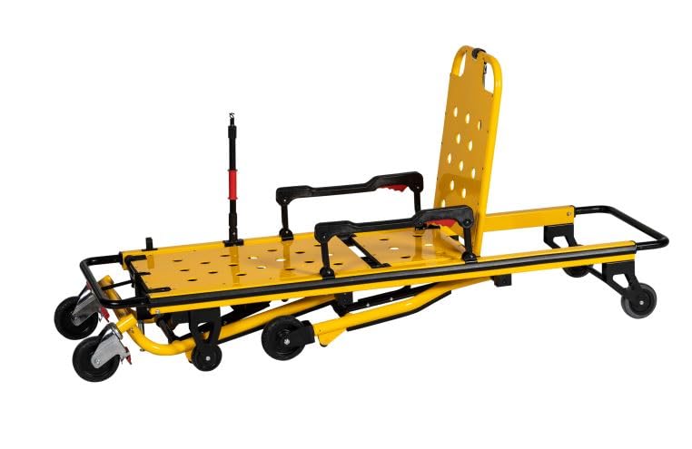 Patient being loaded onto a durable yellow EMS stretcher